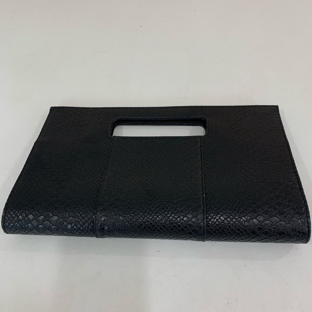 Charming Charlie black clutch. Used once!